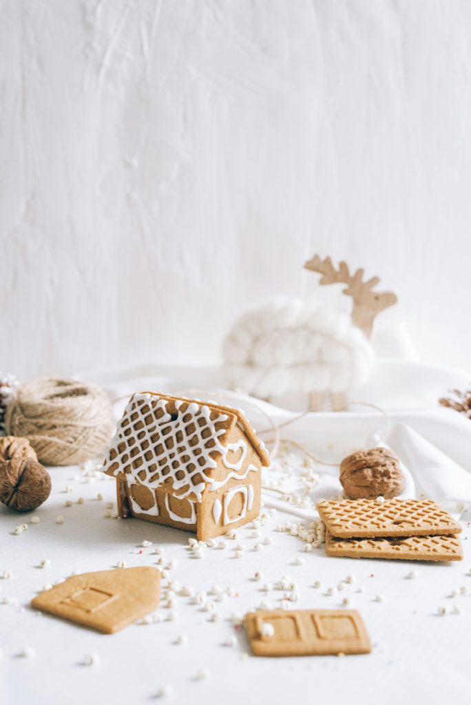 Holiday activities decorate gingerbread houses